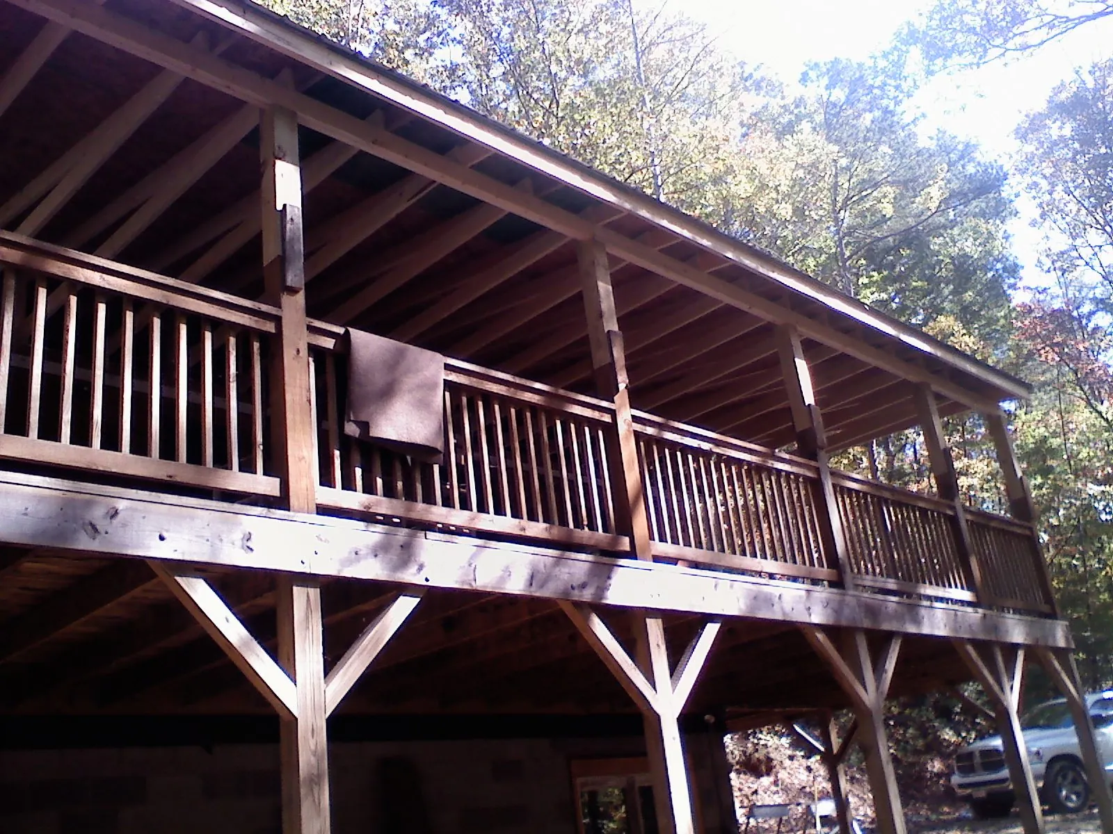 Timber framing under a new elevated porch and deck — Roof Leak Repair in Kenbridge by Roofing Brothers